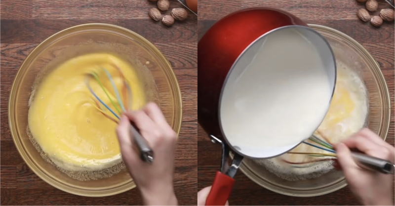 Khuấy trứng và đổ sữa nóng vào tô để làm Eggnog Giáng sinh