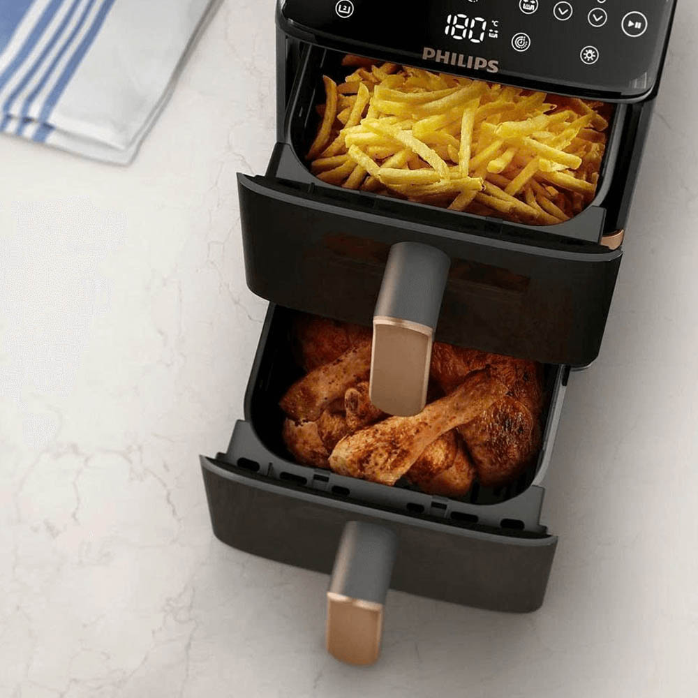 Nồi Chiên Không Dầu Philips NA462/70 có thiết kế hai giỏ nấu xếp chồng