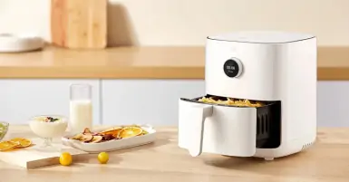 Có thể rút khay trong khi nồi chiên đang hoạt động hay không?