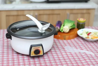 Hướng dẫn vệ sinh nồi lẩu điện đúng cách.