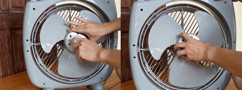  Dùng một tay giữ cố định cánh quạt, tay còn lại tháo cánh quạt 