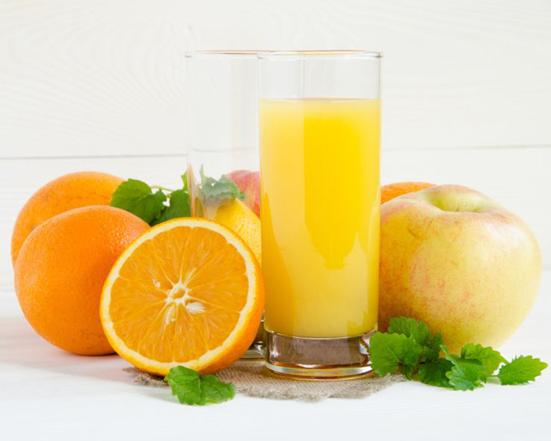 Uống nước ép cam táo trước kỳ kinh nguyệt sẽ mang lại nhiều lợi ích 