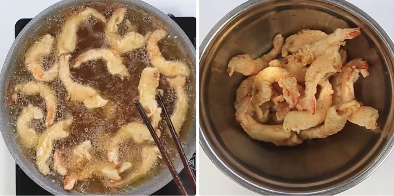 Chiên tôm trong dầu nóng đến khi vàng giòn hoàn hảo