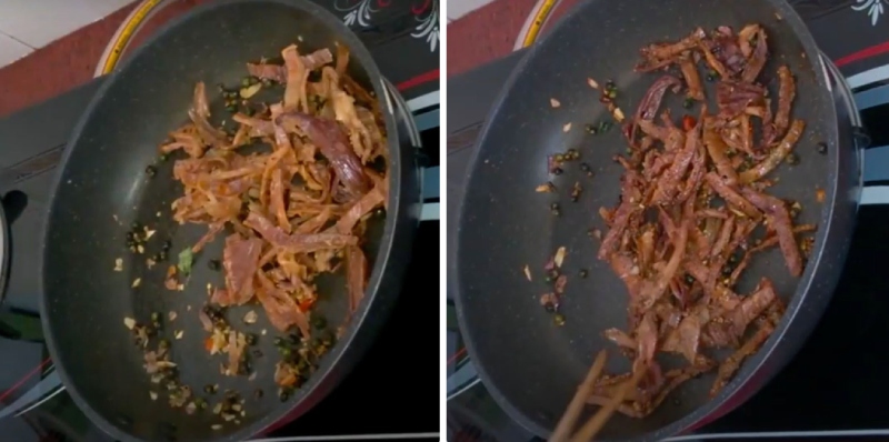 Đảo đều khô mực với tiêu xanh và gia vị trên chảo