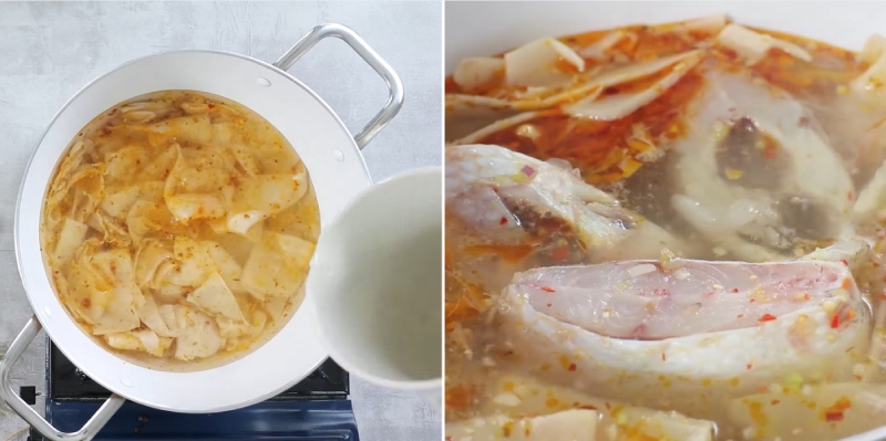 Nồi canh cá diêu hồng măng chua đang sôi trên bếp