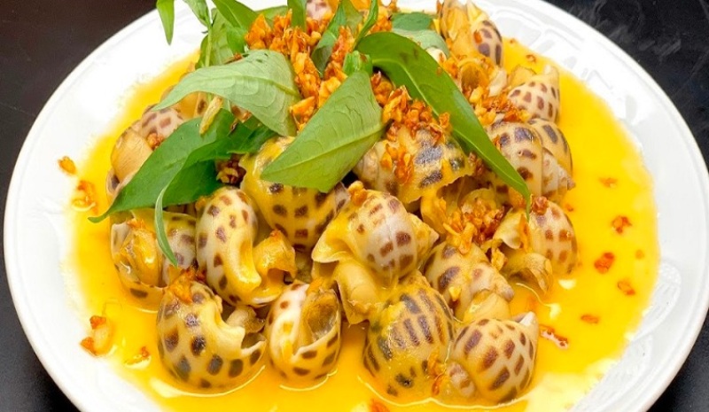 Ốc hương xào bơ tỏi vàng óng, béo thơm và dậy mùi tỏi