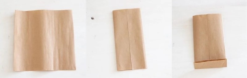Gấp mép đáy túi để làm túi giấy