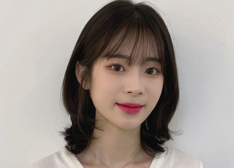 Tóc uốn ngang vai mái thưa