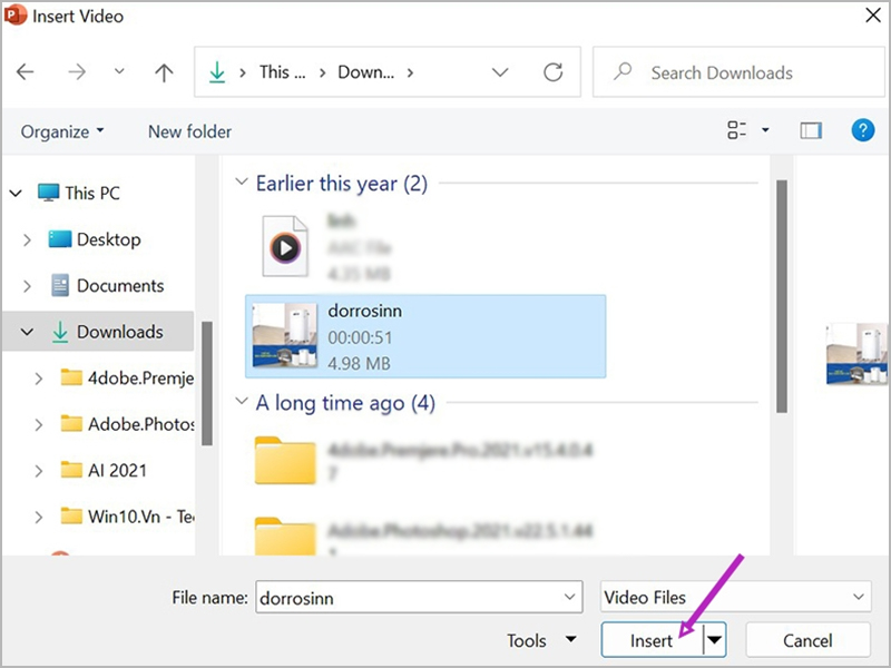 Tìm và chọn tệp video lưu trên máy tính, sau đó nhấn Insert (Chèn)