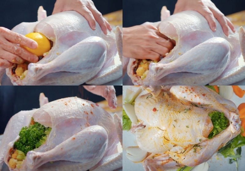 Nhồi nhân và chanh vào bụng gà trước khi nướng