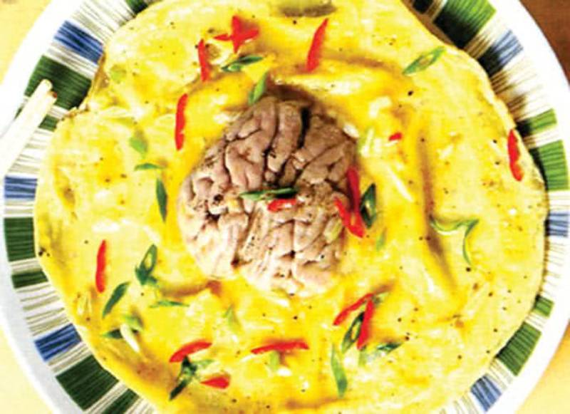 Khám phá cách làm óc heo chiên trứng