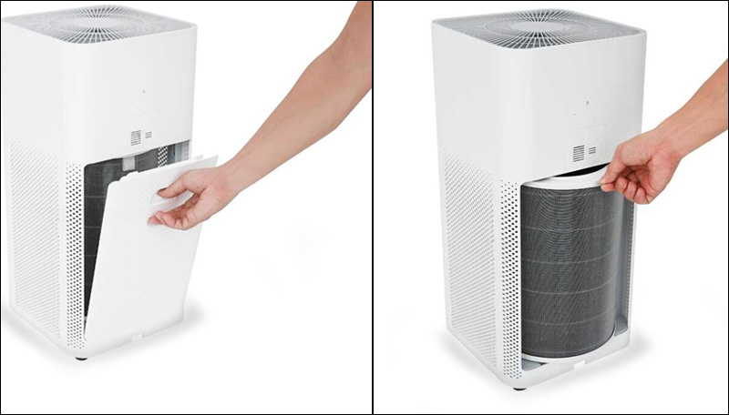 Nhấn đồng thời hai nút ở hai bên hông máy để mở nắp