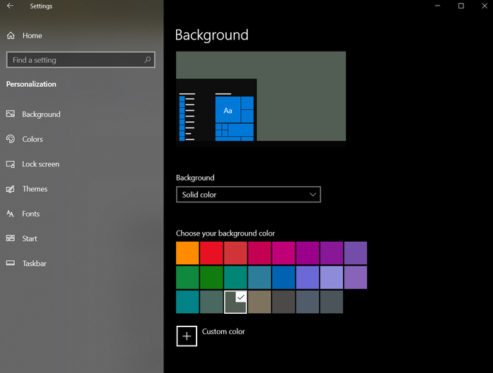 Ngay khi bạn nhấp chọn màu, hình nền Desktop cũng sẽ thay đổi theo.