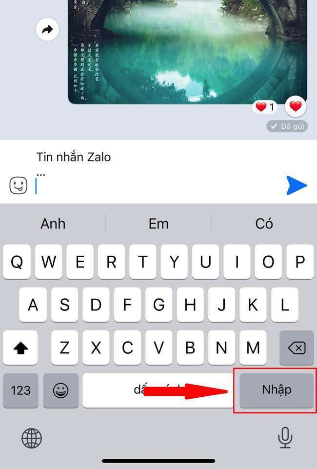 Bạn tiếp tục thấy bên trên keyboard của iPhone với nút "Nhập" nhằm xuống loại lời nhắn Zalo.